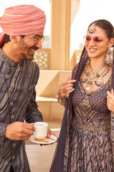 Exclusively for couple combo purple designer outfit in pure PV silk and foil print with detailed hand mirror work